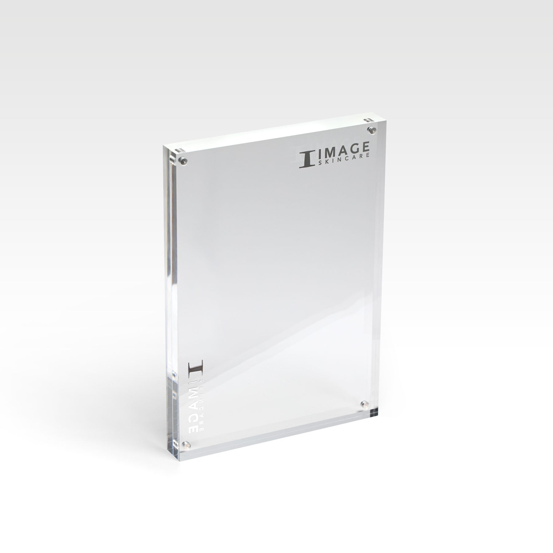 A clear acrylic frame standing vertically with the brand name 'IMAGE' etched into the acrylic. The frame is designed to hold A5 sized paper.