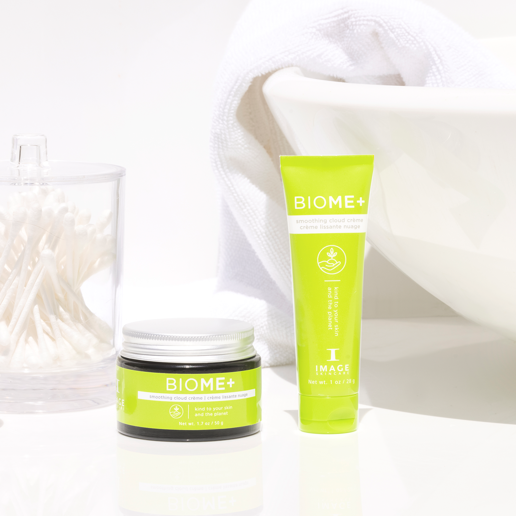 BIOME+ cloud creme retail jar and travel size tube on bathroom counter