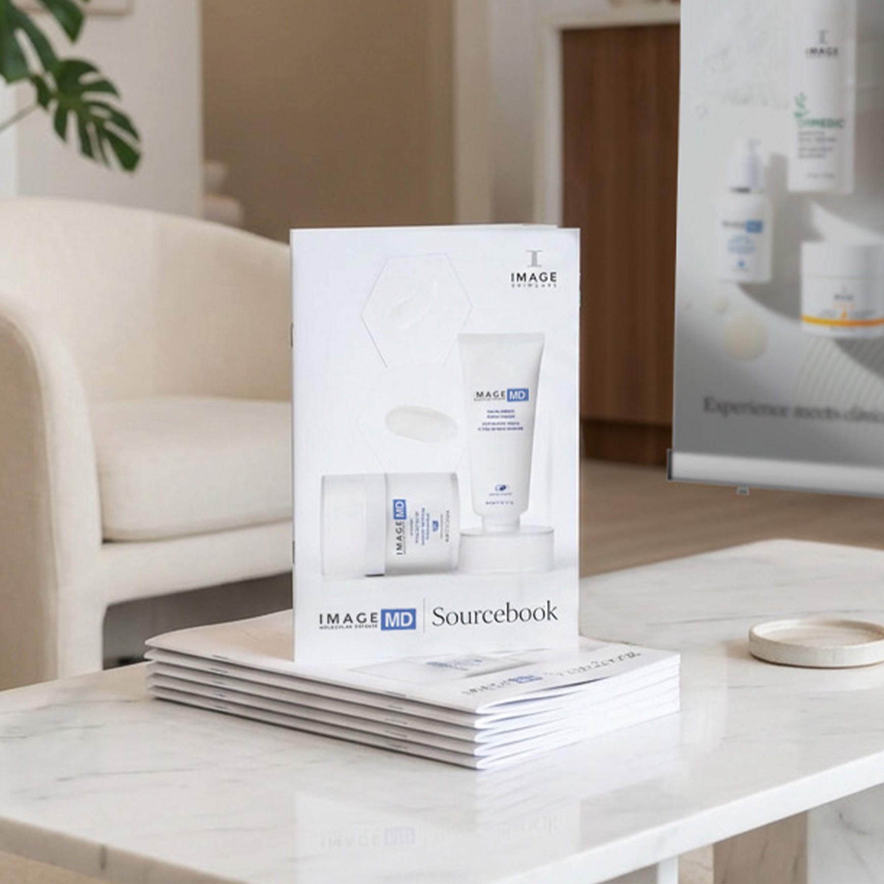 Stack of 'IMAGE' Sourcebook books on a table with a blurred background