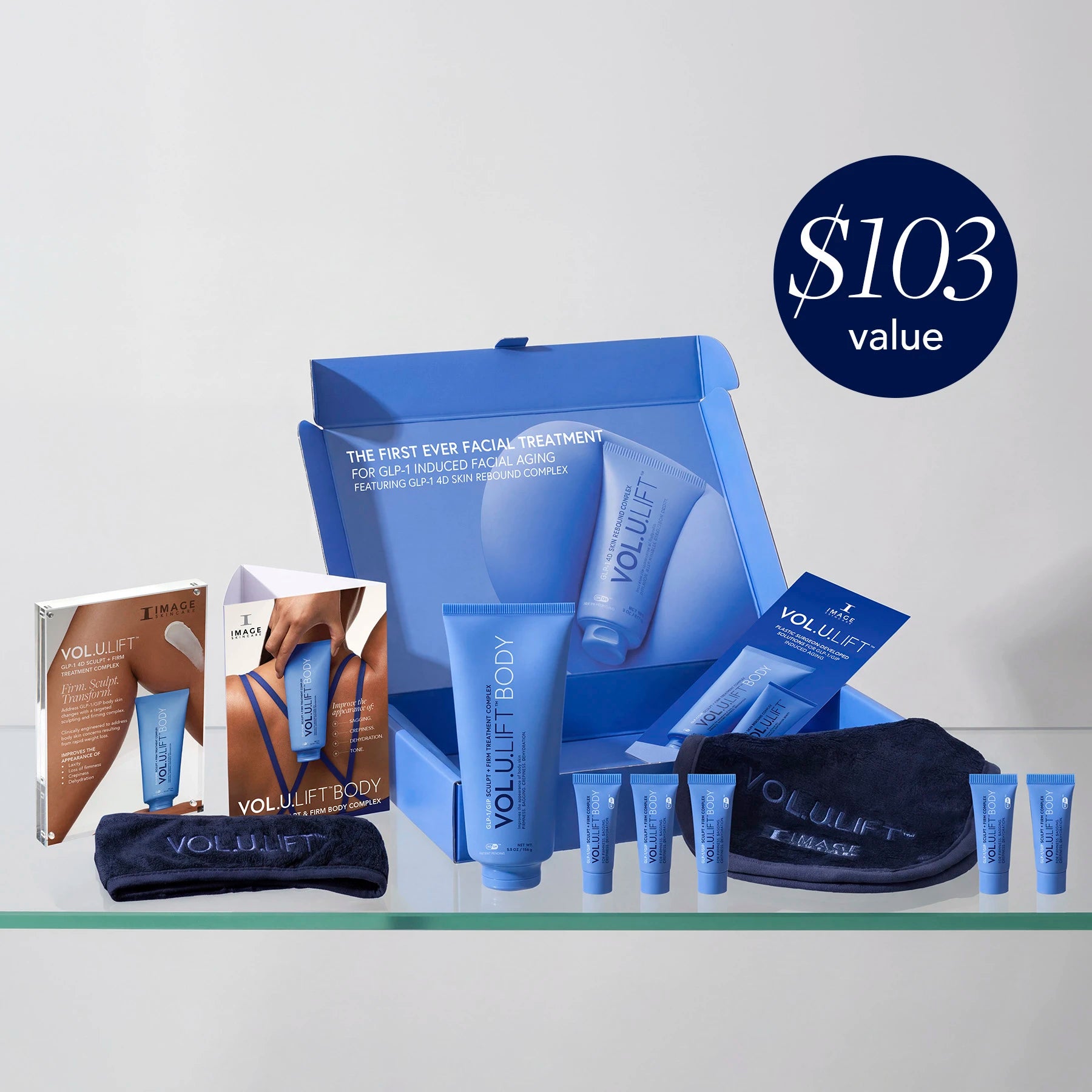 VOLUFLIFT skincare and body care product set with packaging on a light gray background