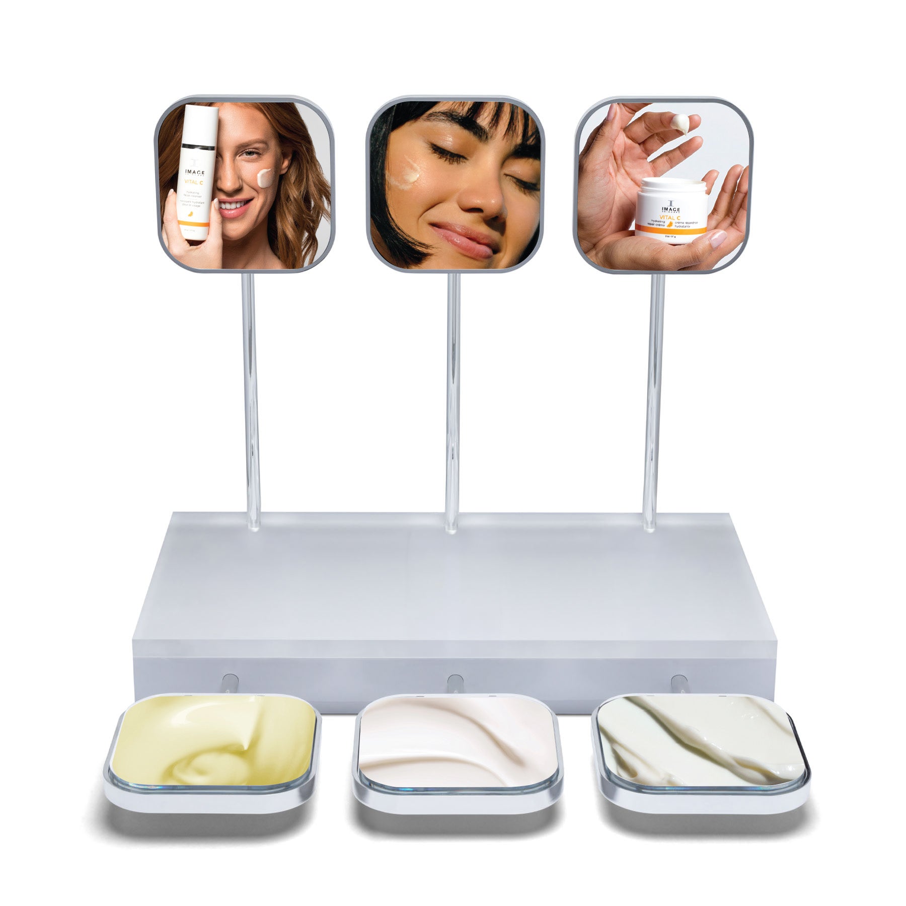 Display stand with mirrors and cosmetic products on a white background