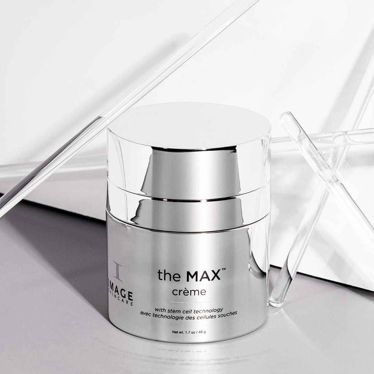 max creme jar on silver background