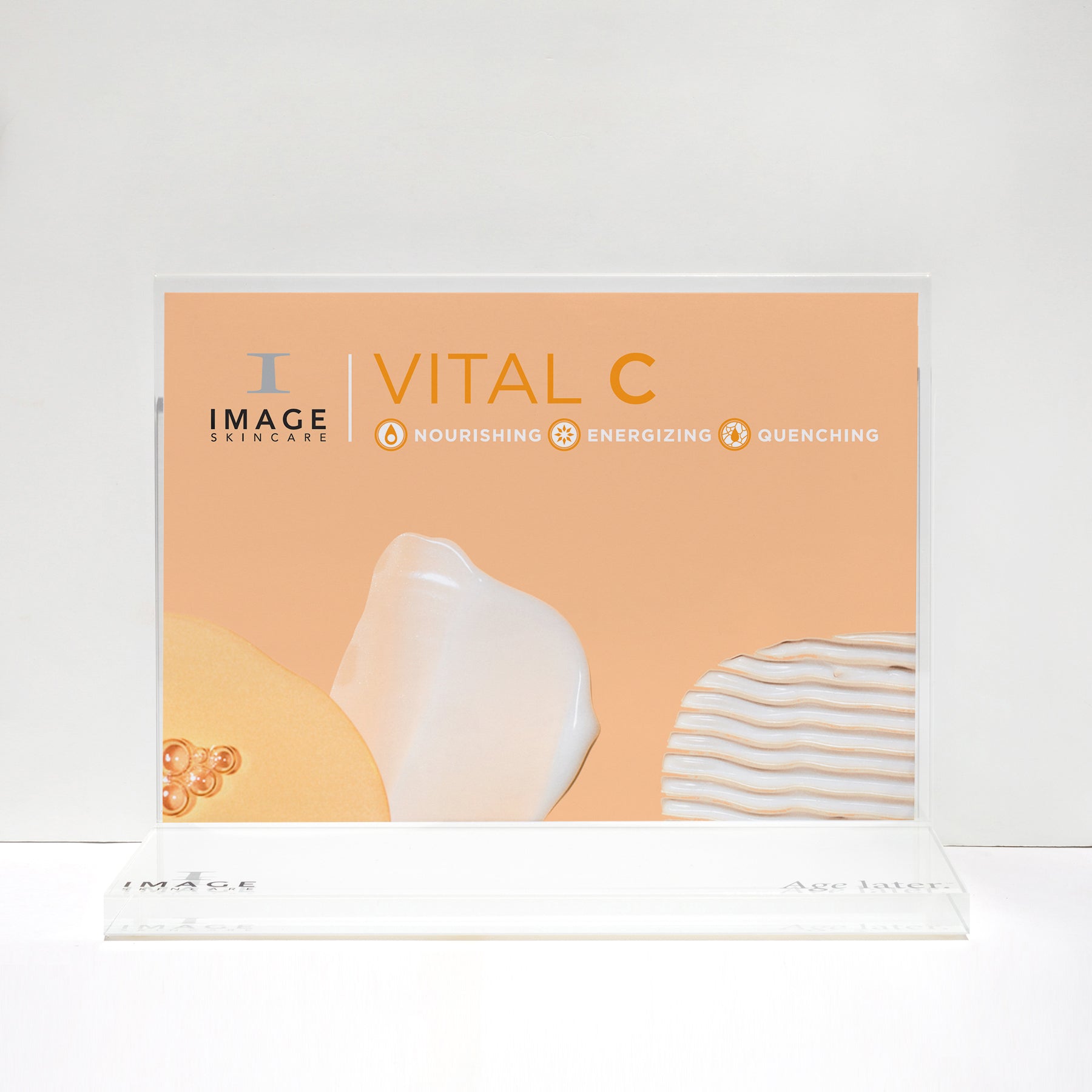 VITAL C flyer inside clear acrylic display