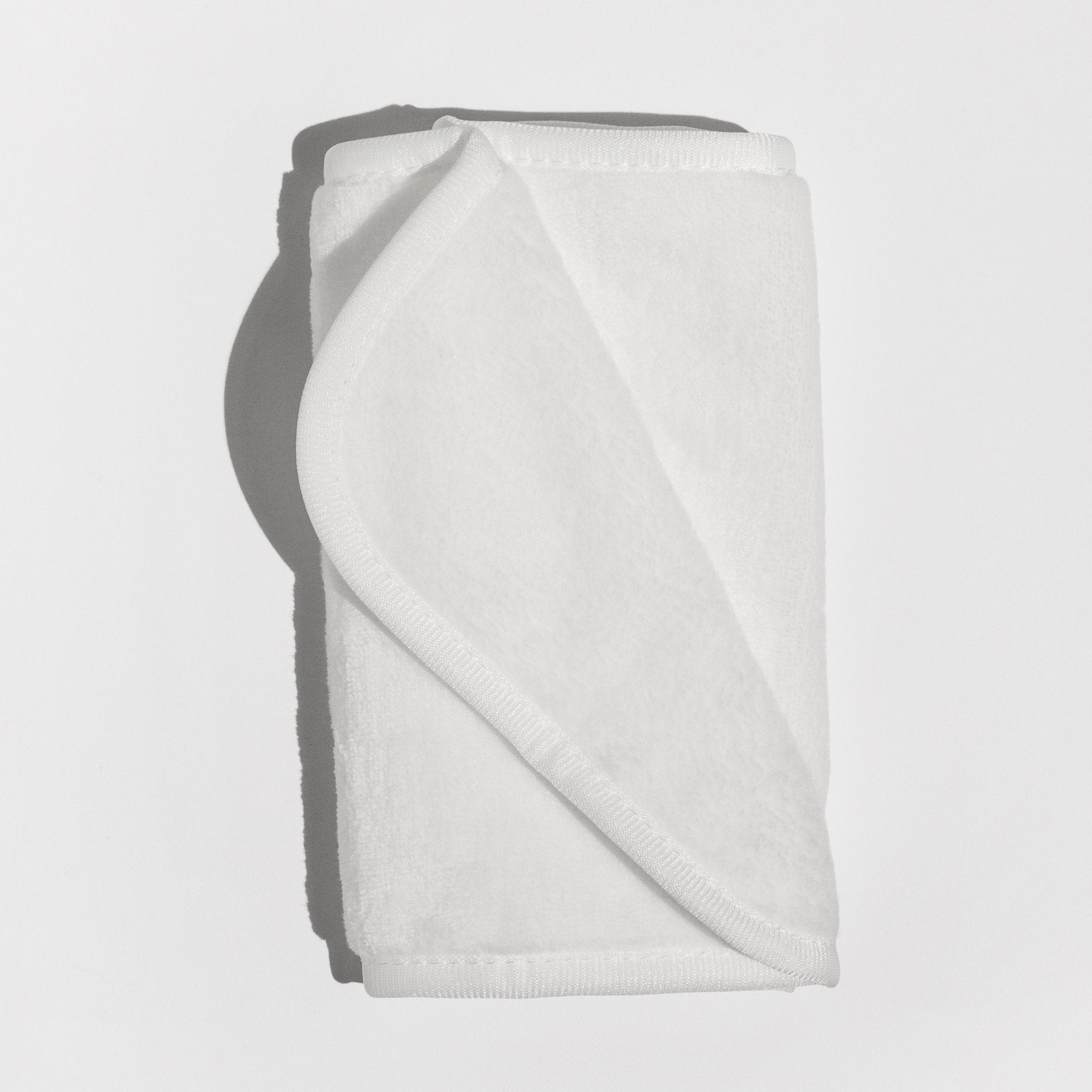 white makeup eraser cloth on white background